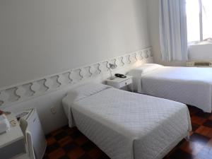 Letto o letti in una camera di Hotel Bruggemann