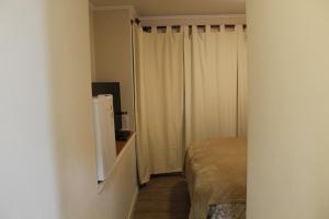 Postel nebo postele na pokoji v ubytování habitac privada Bed n Bkf Patagonia Norte - Puerto Varas Homestay - BnB Plus