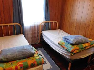 Katil atau katil-katil dalam bilik di Cottage 57 - Topspot Cottages