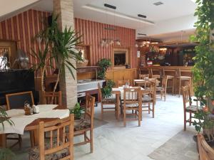 A restaurant or other place to eat at Mirana Family Hotel