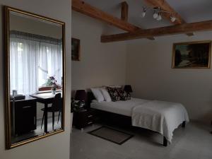 En eller flere senge i et værelse på Apartamenty Avanti-Stare Miasto Zamość