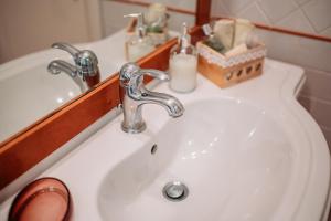 Koupelna v ubytování B&B Greco Home