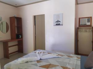 Postel nebo postele na pokoji v ubytování JPH Resort