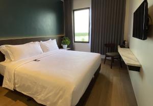 TV a/nebo společenská místnost v ubytování Luminor Hotel Tanjung Selor By WH
