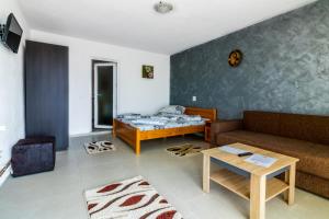 Postel nebo postele na pokoji v ubytování Casa Alex