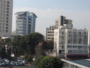 a group of tall buildings in a city at Delphi Hotel in Nicosia