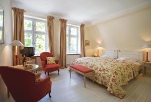 Postel nebo postele na pokoji v ubytování Hotel Ole Liese