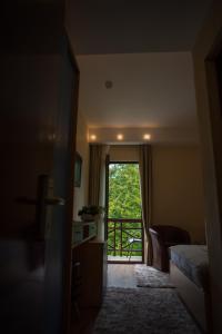 Postel nebo postele na pokoji v ubytování Hotel Marami
