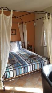 Postel nebo postele na pokoji v ubytování B&B La Clé du Sud