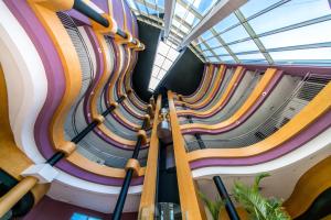 a view from the top of a building with colorful pipes at Albir Playa Hotel & Spa in Albir