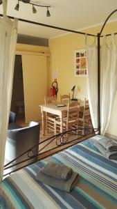 Postel nebo postele na pokoji v ubytování B&B La Clé du Sud