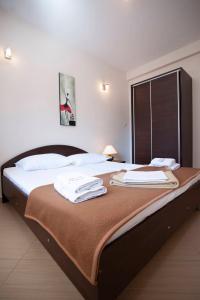 Ліжко або ліжка в номері Mandir apartments - Center