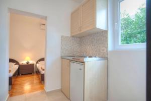 Кухня або міні-кухня у Mandir apartments - Center