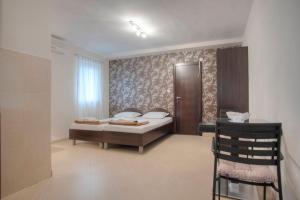 Ліжко або ліжка в номері Mandir apartments - Center