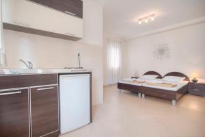 Кухня або міні-кухня у Mandir apartments - Center