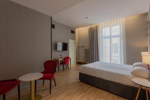 Un ou plusieurs lits dans un hébergement de l'établissement Ibis Styles Toulouse Capitole