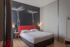Un ou plusieurs lits dans un hébergement de l'établissement Ibis Styles Toulouse Capitole