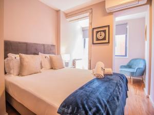 En eller flere senge i et værelse på ALIBI by YoursPorto