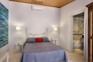Un pat sau paturi într-o cameră la Hotel El Molí