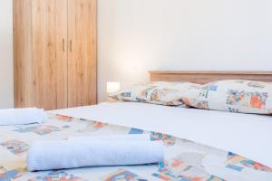 Postel nebo postele na pokoji v ubytování Apartments Žilić