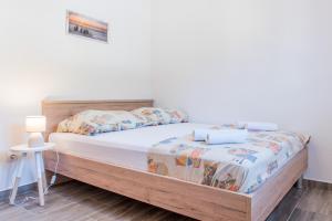Postel nebo postele na pokoji v ubytování Apartments Žilić