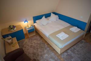 Postel nebo postele na pokoji v ubytování Hotel Marami