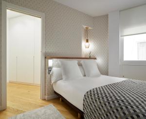 Postel nebo postele na pokoji v ubytování Salamanka by FeelFree Rentals