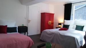 Ein Bett oder Betten in einem Zimmer der Unterkunft Manoir -1654- historisch schlafen in Monschaus Altstadt