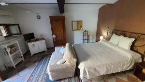 Postel nebo postele na pokoji v ubytování Le Quattro Stagioni B&B and Apartament + 33 fotografií