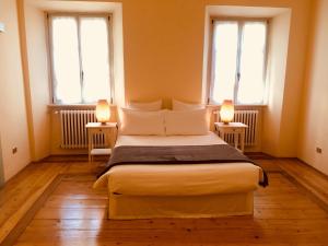 Postel nebo postele na pokoji v ubytování Al Cavour 34