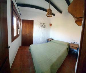 Postel nebo postele na pokoji v ubytování Casas Rurales La Minilla