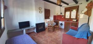 Posezení v ubytování Casas Rurales La Minilla + 28 fotografií