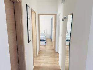 Posteľ alebo postele v izbe v ubytovaní Apartman Irena 3
