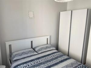 Posteľ alebo postele v izbe v ubytovaní Apartman Irena 3