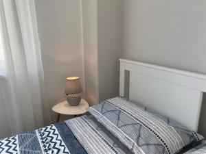 Posteľ alebo postele v izbe v ubytovaní Apartman Irena 3