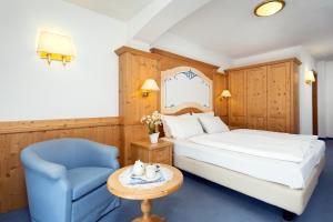 Postel nebo postele na pokoji v ubytování Hotel Gries