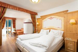 Postel nebo postele na pokoji v ubytování Hotel Gries