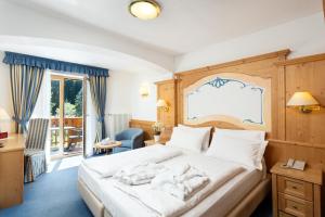 Postel nebo postele na pokoji v ubytování Hotel Gries