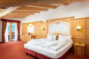 Postel nebo postele na pokoji v ubytování Hotel Gries