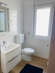 Kúpeľňa v ubytovaní Apartman Irena 3