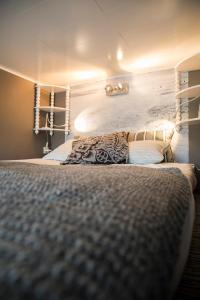 
A bed or beds in a room at Charming studio in Bredene
