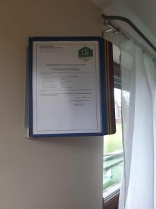 Certificat, récompense, panneau ou autre document affiché dans l'établissement A La Reid Paisible