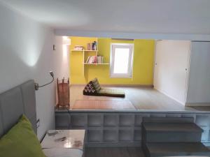 A bed or beds in a room at Mini Loft Fronte Mare
