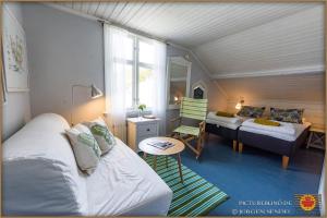מיטה או מיטות בחדר ב-Hem till Bengt