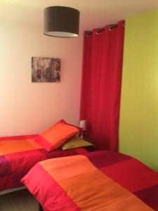 Postel nebo postele na pokoji v ubytování LE GERLE + 9 fotografií