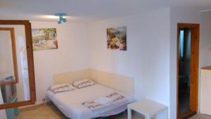 Postel nebo postele na pokoji v ubytování Cozy Studio #2, with terrace