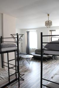 Poschodová posteľ alebo postele v izbe v ubytovaní Schrott Bed&Beer