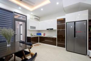 A kitchen or kitchenette at Sonny Homestay Hạ Long - Villa 5 Bedroom