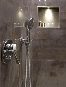 a shower with a blow dryer in a bathroom at Residence Poli Venezia in Venice