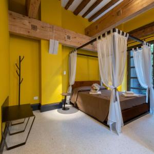 Posteľ alebo postele v izbe v ubytovaní Residence Poli Venezia